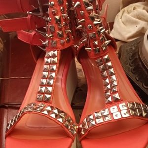 A spike heel shoes new and other